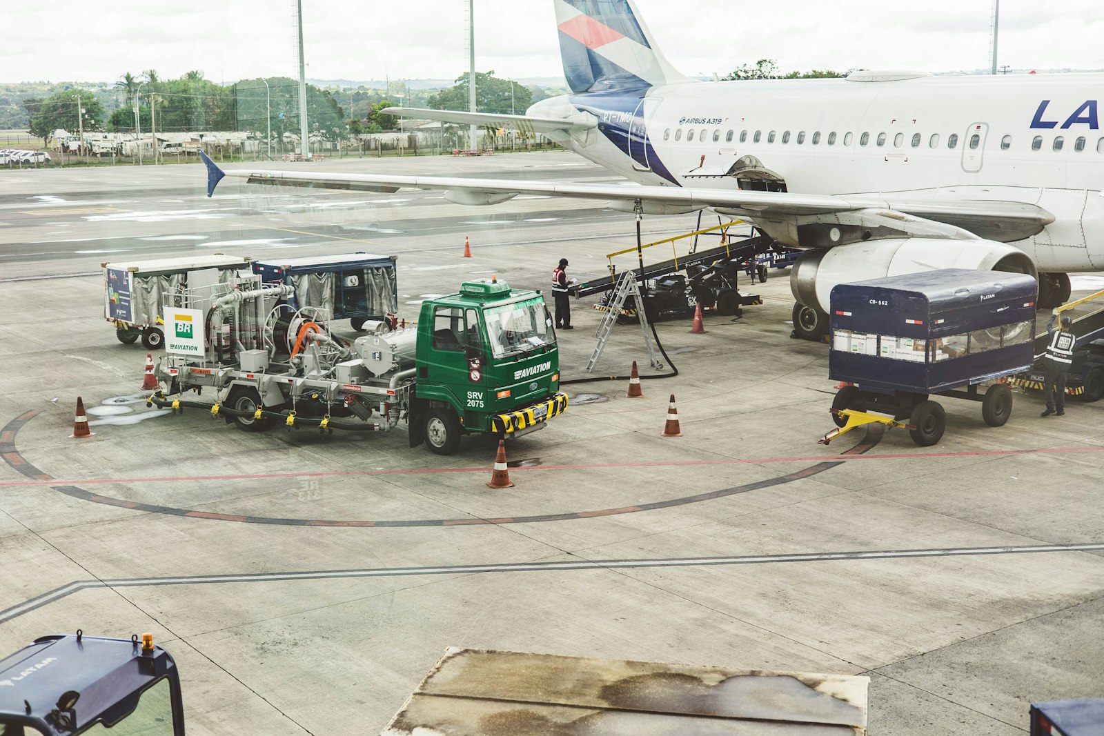 Aircraft being refuelled on the apron